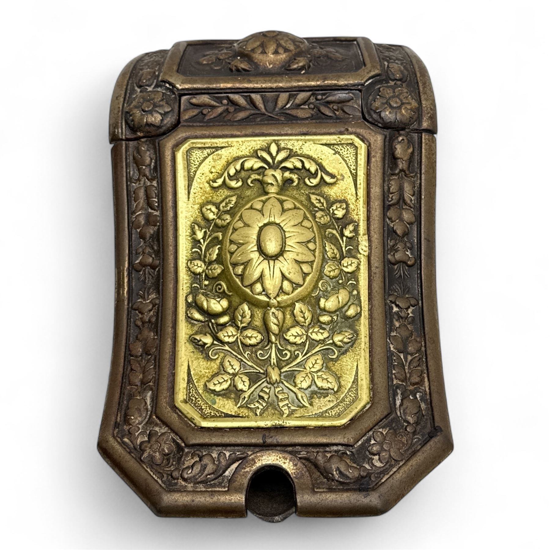 Late 19th century Victorian cast iron and brass purdonium, domed lid with central embossed sunflower and foliage panel within a floral border, flanked by scrolled and foliate detail, raised on shaped feet