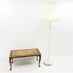 White standard lamp with shade (H158cm) and a carved wood coffee table 