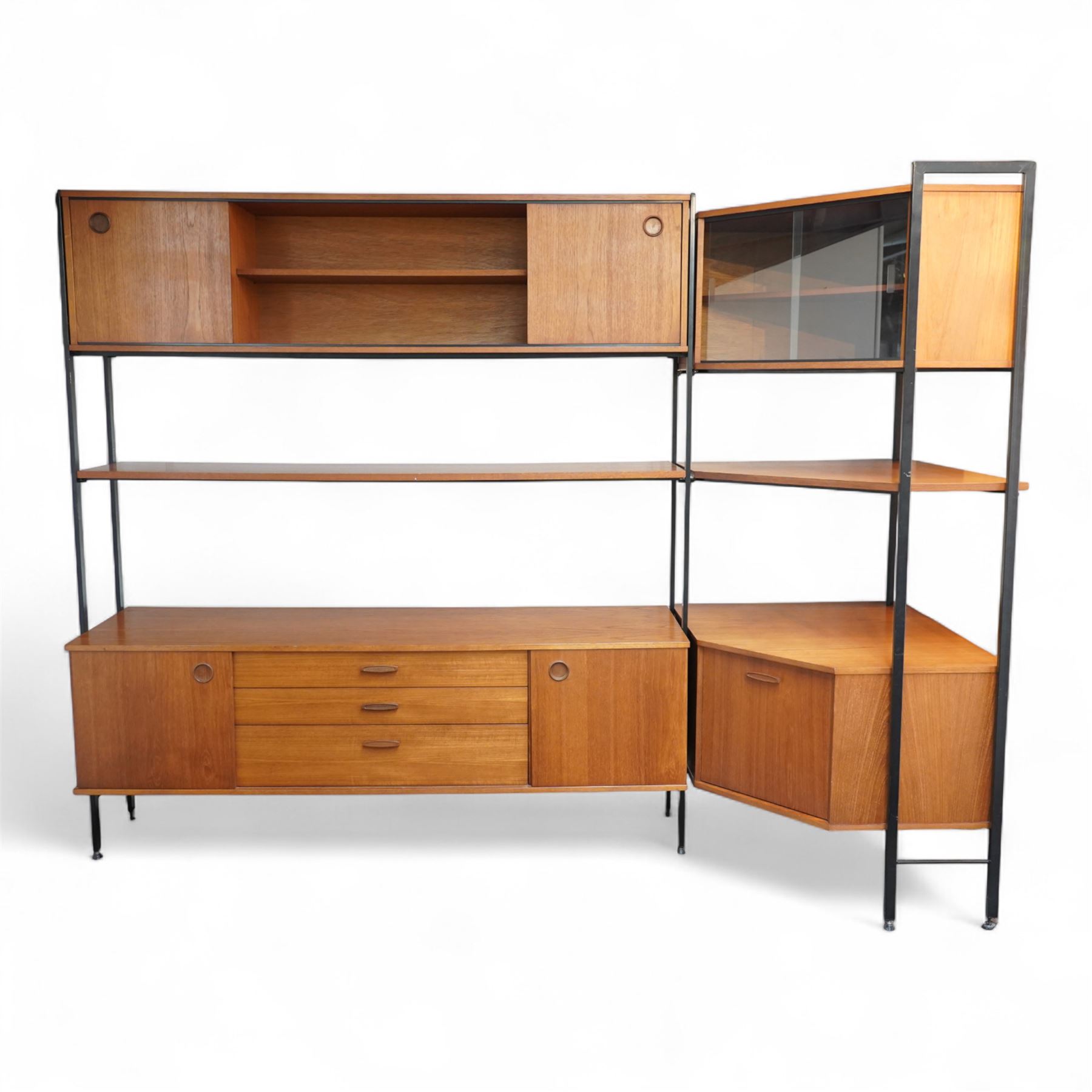 Avalon - modular teak wall unit, with black metal supports, fitted with cupboards, drawers, and adjustable shelves, corner configuration