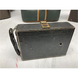 Miranda Sensorex camera body, Miranda Sensorex II camera body with 'Auto Miranda 1:1.8 f-59mm' lens, 'Auto Miranda 1:2.8 f-135mm' lens, 'Auto Miranda 1:3.5 f-200mm' lens, 'Auto Miranda 1:2.8 f-28mm' len, Agfa plate camera with 9cm x 12cm plates and other camera equipment including Miranda camera bag