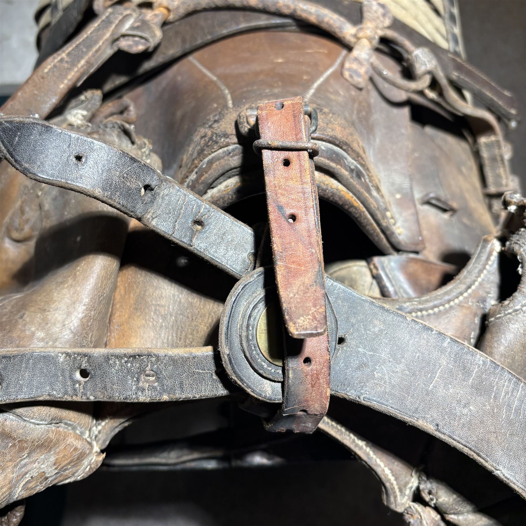 WWI French cavalry 17'' saddle, model 1916, with leather saddle bags, stirrups, girth and bit  
