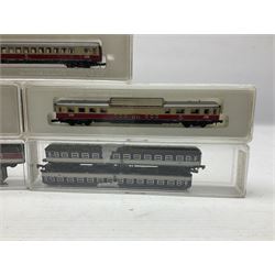 Marklin mini-club 'Z' gauge - twelve passenger coaches nos.8610, two 8611, 8613, 8700, two 8701, 8720, 8721, 8722, 8723 and 8725; together with four others in two unassociated boxes; all in hard plastic boxes (16)