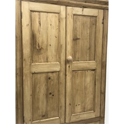 *Traditional pine larder cupboard, projecting moulded cornice over four panelled doors, shaped plinth base, W101cm, H191cm, D56cm