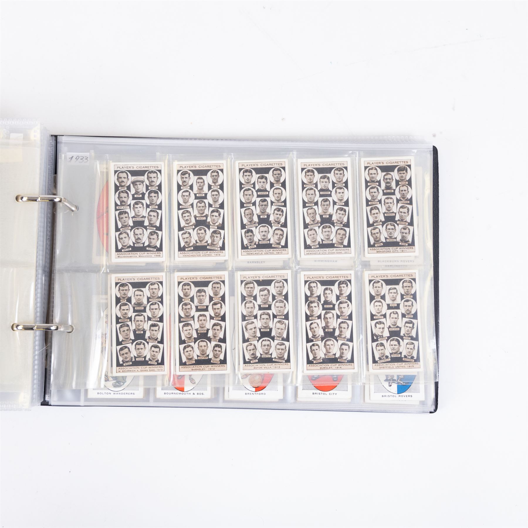 Collection of Edwardian and later Football related trading and cigarette cards, including forty-nine of fifty 1906 Ogden's Football Club Colours, 1922 PALS Footall series, ninety of one hundred 1925 Gallaher Famous Footballers, complete set of forty-four 1926 Ogden's Captains of Association Football Clubs and Colours, complete set of fifty 1927 Players Football Caricatures by MAC,  complete set of fifty 1927 Players Football Caricatures by RIP,  complete set of fifty 1930 Players Association Cup Winners, complete set of 50 1933 Ogdens AFC Nicknames etc, housed in brown cigarette card album