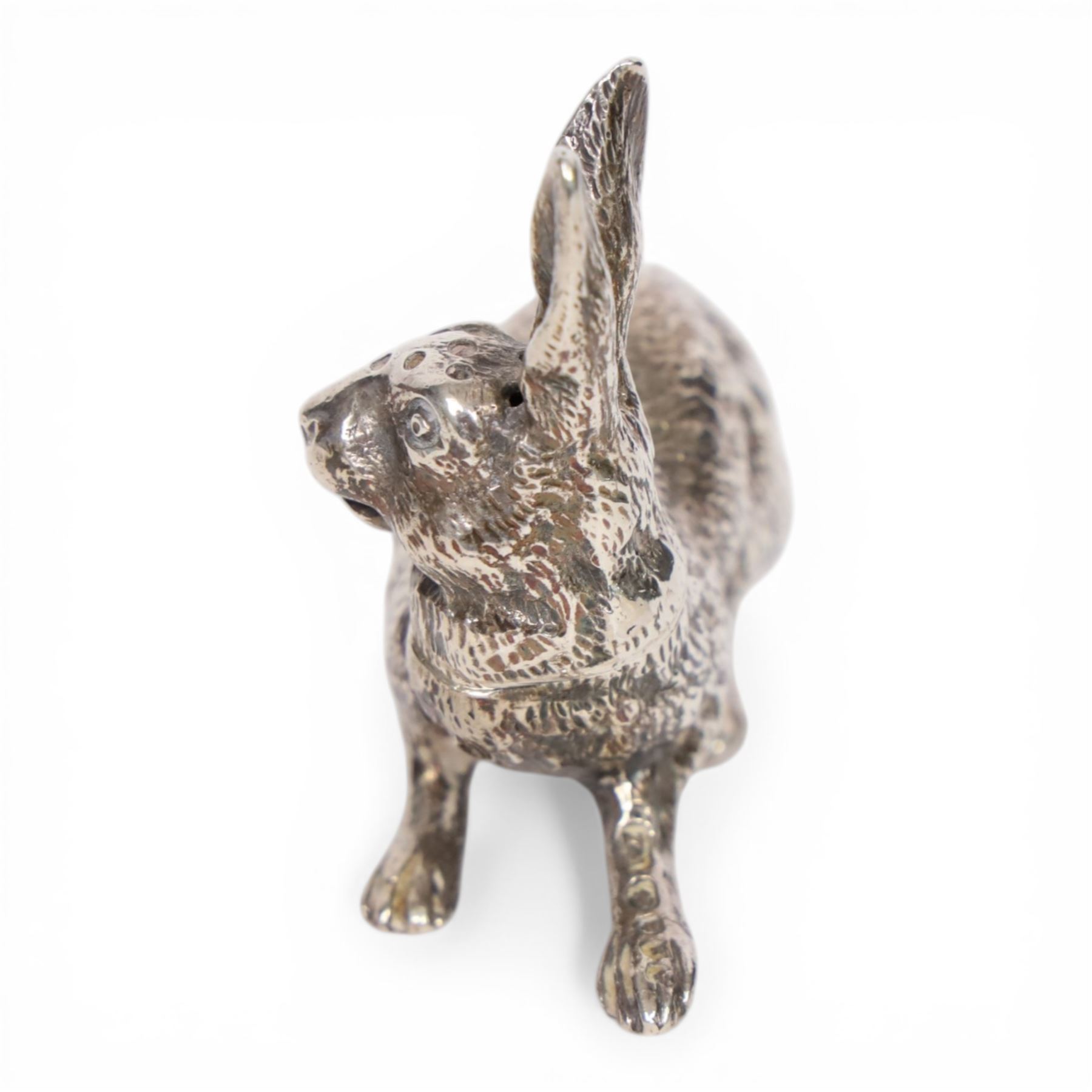 Victorian silver novelty pepperette, naturalistically modelled as a hare, hallmarked Thomas Johnson II, London 1885, L6cm

