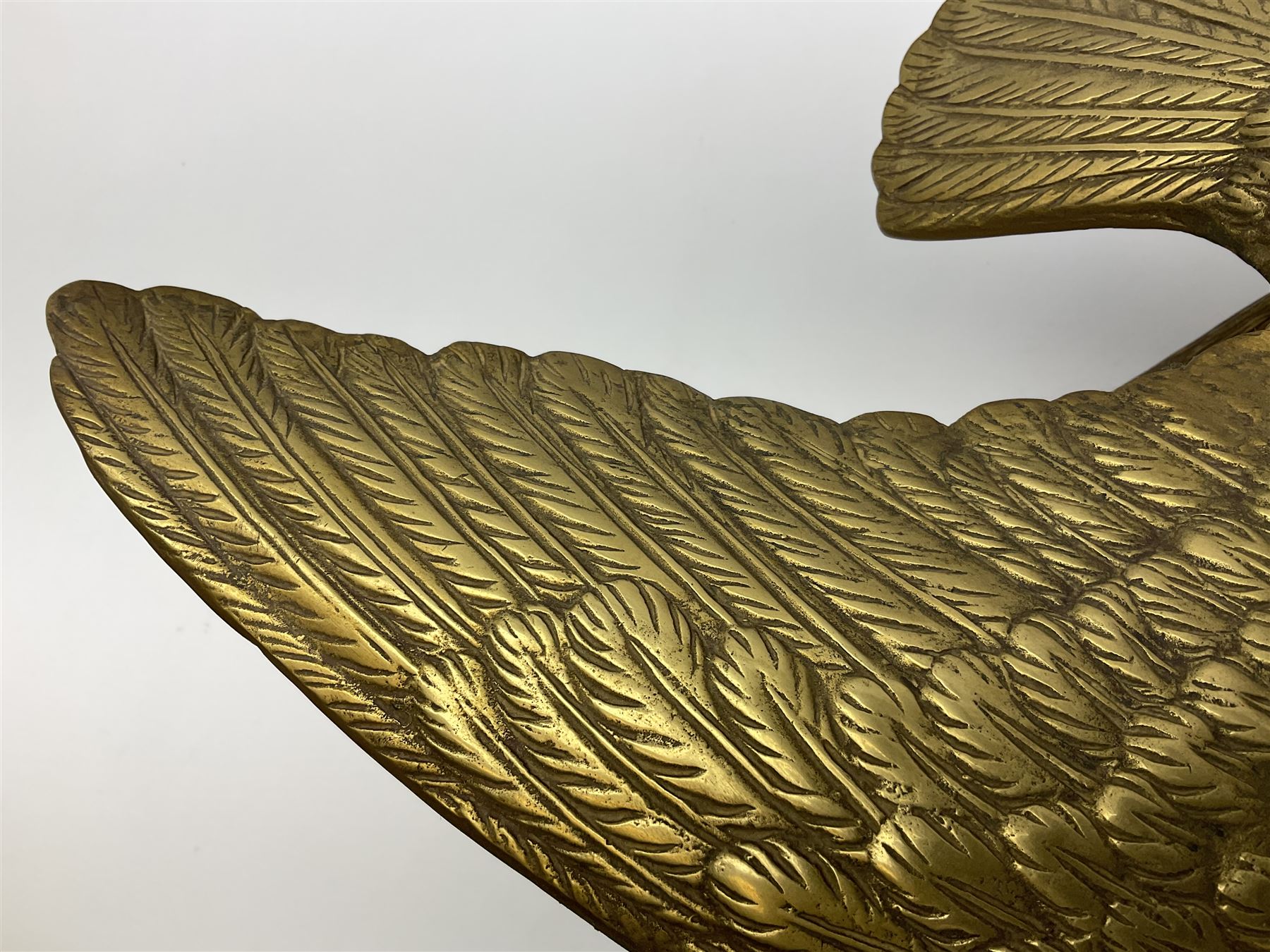 Large brass figure of an eagle on a branch, H51.5cm