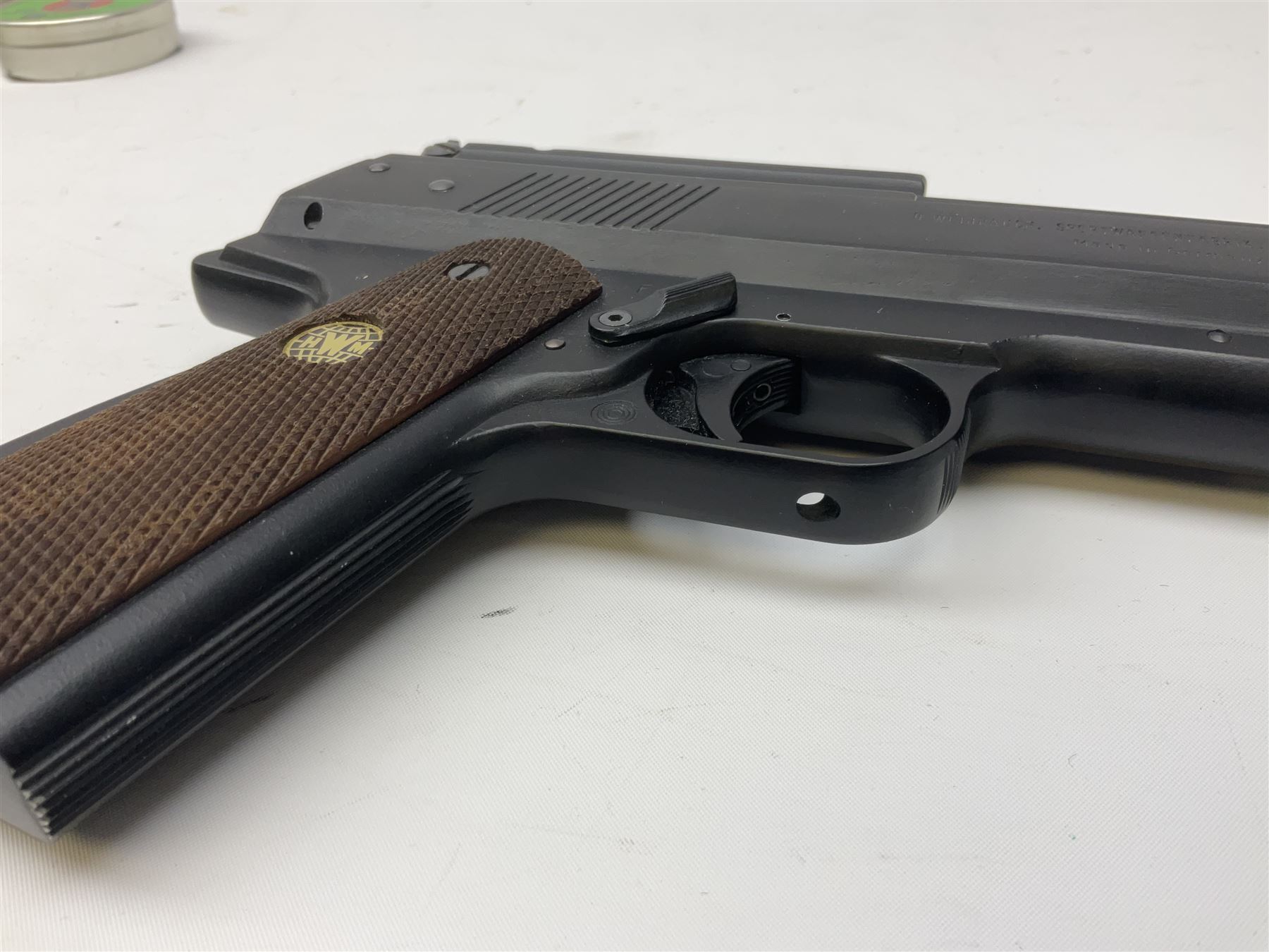 H. Weihrauch HW45 air pistol, .177 calibre, over-lever mechanism, chequered grip No.372679 L31cm; and quantity of pellets