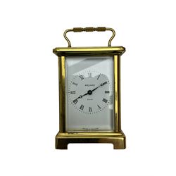  20th century French cornice “Bayard” 8-day timepiece carriage clock, with a lever platform escapement, enamel dial with roman numerals and minute track and Haller Torsion clock with acrylic dome
