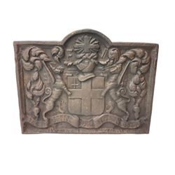 Cast iron fire back, decorated with Heraldic crest 