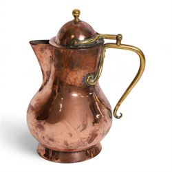 Birmingham Guild of Handicrafts - Arts and Crafts copper jug, with brass handle and finial...