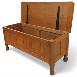 Squirrelman - oak six panel blanket box, on octagonal feet, squirrelman carving on the feet by Wilfred Hutchinson, Husthwaite, Thirsk