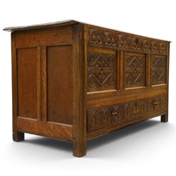 18th century carved oak coffer, rectangular hinged top over a lunette-carved frieze and tracery-style carved triple panelled front, the lower rail carved with repeating anthemion motifs, on square feet