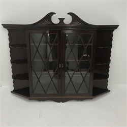  Early 20th century wall hanging display cabinet, swan neck pediment, two door enclosing three shelves, W130cm, H102cm, D20cm  