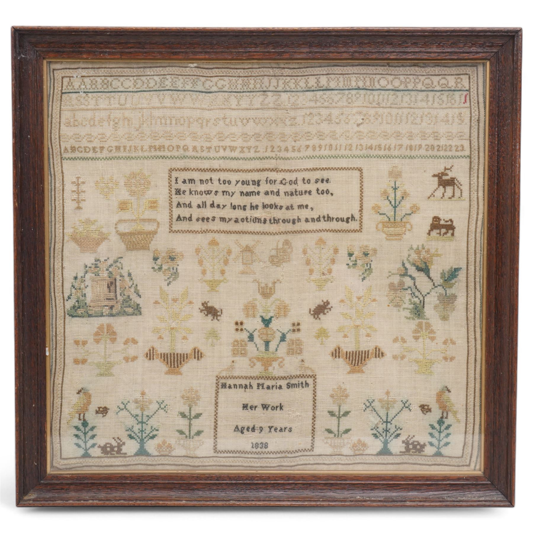 Early Victorian needlework sampler inscribed 'Hannah Maria Smith. Her Work, Aged 9 Years 1838' with alphabet, numerals, verse, trees etc 31cm x 33cm