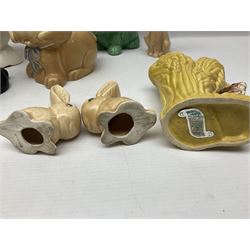 Collection of Sylvac and similar animal figures, including rabbits, hares and dogs, together with Falcon budgie vase, etc 