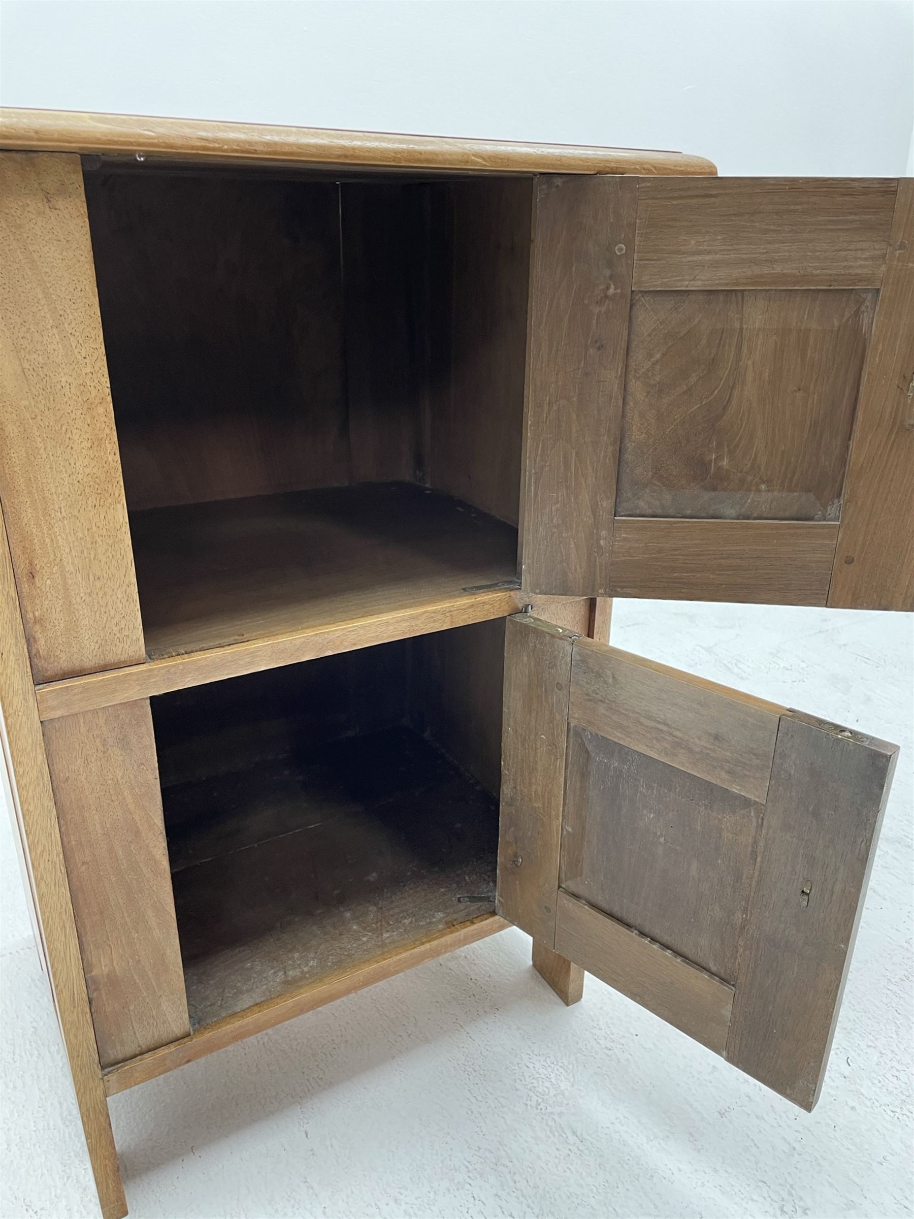 Ernest Gimson (1864-1919) - circa. 1904-1910, Arts & Crafts chestnut wood cabinet, visible wedged tenon joints, enclosed by two fielded panelled doors fitted with brass droplet handles, panelled sides and back, stile supports
Provenance: The vendor is a relative of Benjamin Fletcher who was headmaster of Leicester School of Art in the early 1900s. He was associated with Gimson and involved in setting up the Dryad company. 

The cabinet was acquired by Fletcher during his time in Daneway, Sapperton where Gimson had workshops. The cabinet stayed in the family and has been passed down to the current vendor.