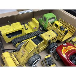 Tonka - fourteen pressed steel vehicles including Pick-up Truck, Tractor Digger, Mobile Crane, Trencher, Beach Buggy, two Bulldozers, Digger, Low Loader, Farm Trucks etc; and small quantity of spare parts (14)