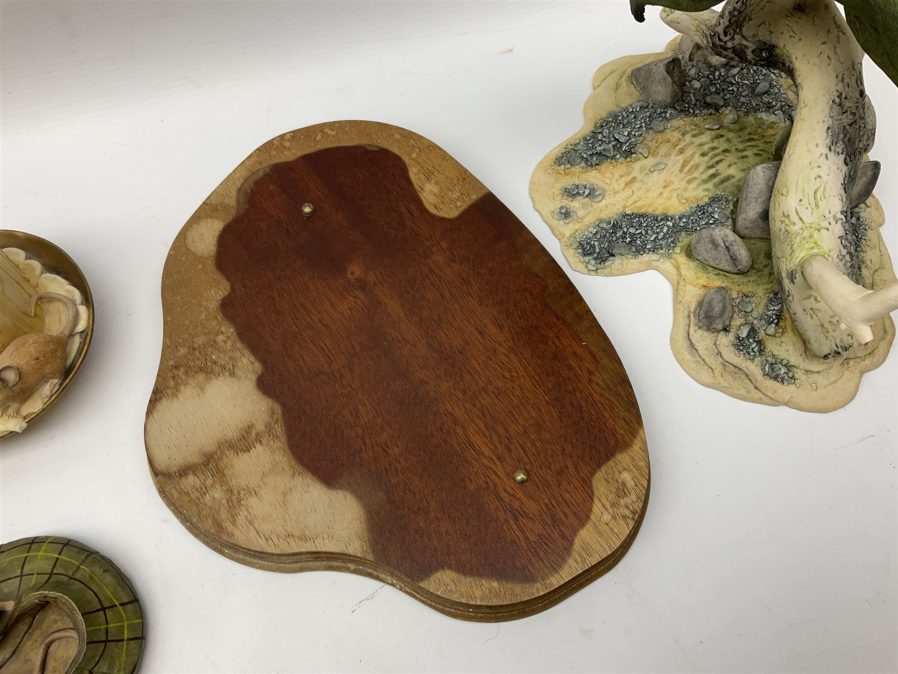 Border Fine Arts, swimming otter, together with three country artists figures, mice on candle stick, mice on garden tap, mice in cap, otter H26cm