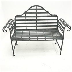  Distressed metal bench, shaped back and scrolled arms, W135cm,   