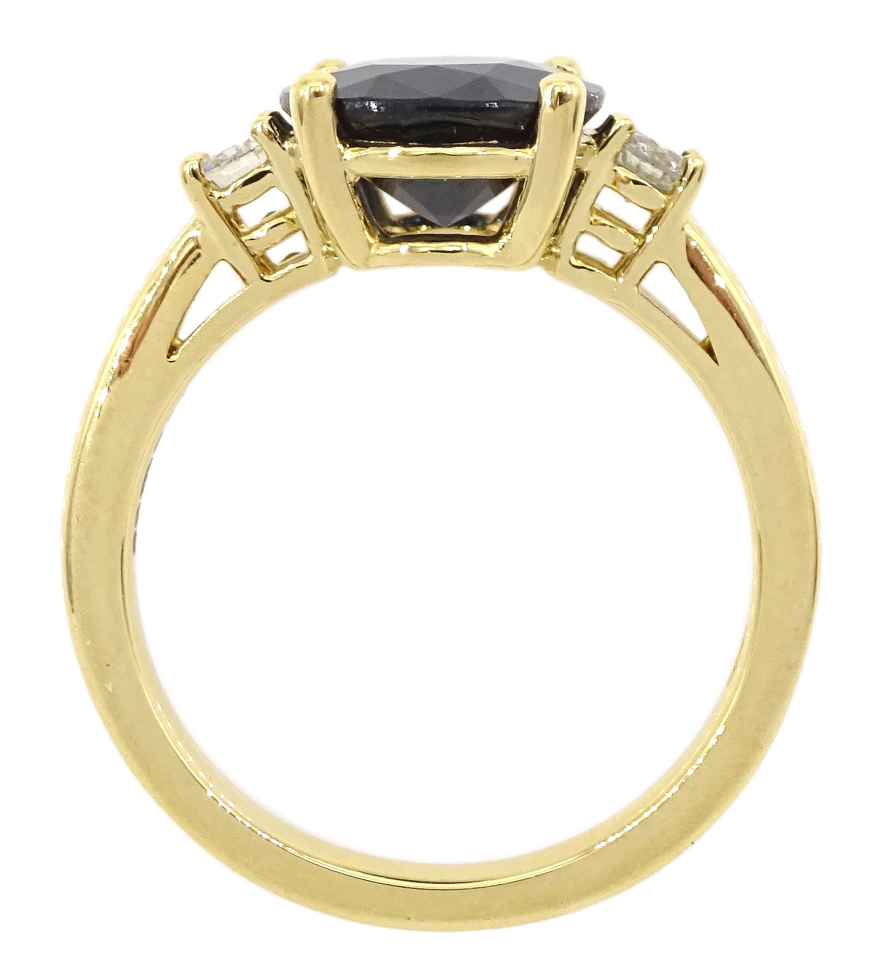 18ct gold sapphire and diamond three stone ring, single oval cut sapphire of approx 3.45 carat, with a round brilliant cut diamond set either side, hallmarked