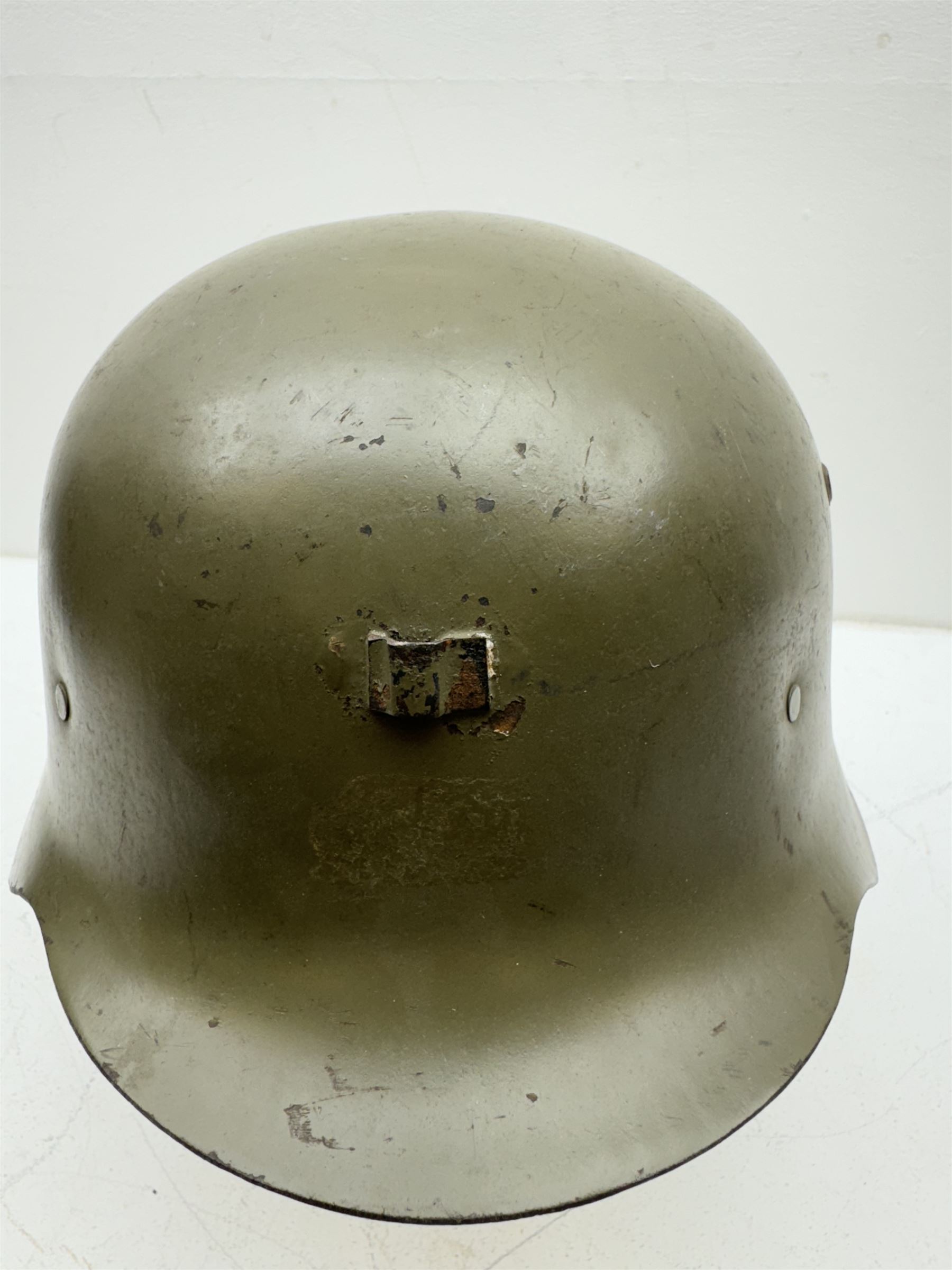 WWII Spanish combat steel helmet model Z, with leather lining and canvas strap, interior D22cm 
