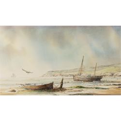 David C Bell (British 1950-): Two Boats Moored on Robin Hood's Bay, watercolour signed 34cm x 61cm