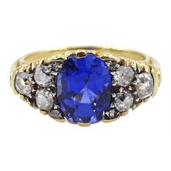 18ct gold oval synthetic sapphire and six stone old cut diamond ring 