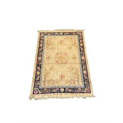 Chinese beige ground rug, blue border