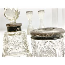 Group of silver, to include napkin ring with engraved foliate decoration hallmarked Henry Williamson Ltd,  together with various stamped silver lidded and collared 19th century and later cut glass scent bottles, silver collared glass vases etc (7) weighable silver approx 55g