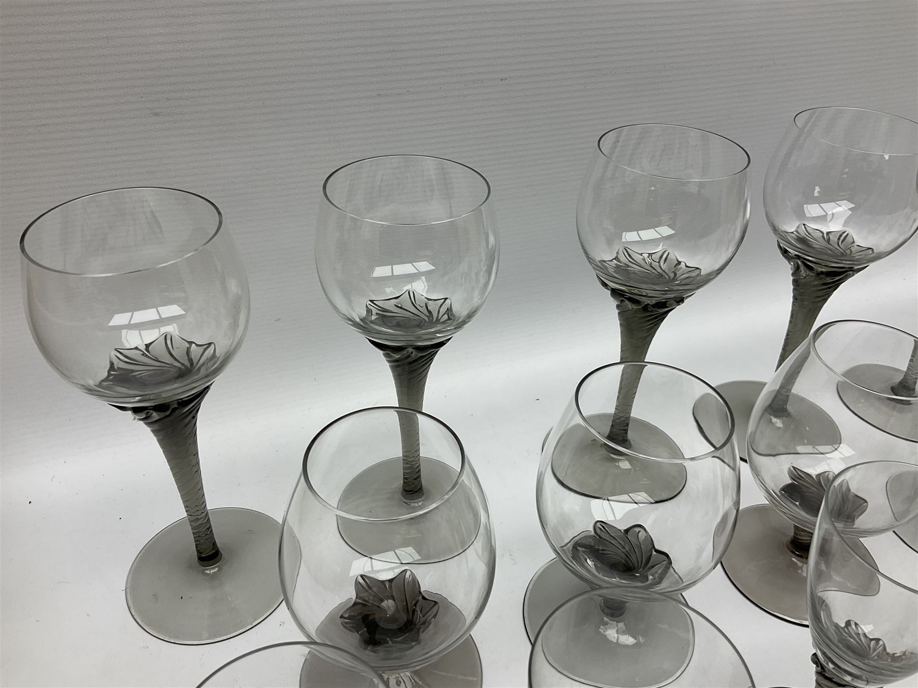 Murano glass figure of a recumbent horse, Murano Lavorazione purple and pink flower, and quantity of matching drinking glasses