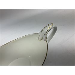 Coalport Revelry pattern tea and dinner wares, comprising nine dinner plates, four salad plates, eleven side plates, sauce boat and stand, ten teacups and ten saucers, and preserve pot and cover, together with a Coalport plate of shaped form decorated with pink roses, and a Royal Crown Derby Royal Antoinette pattern trio