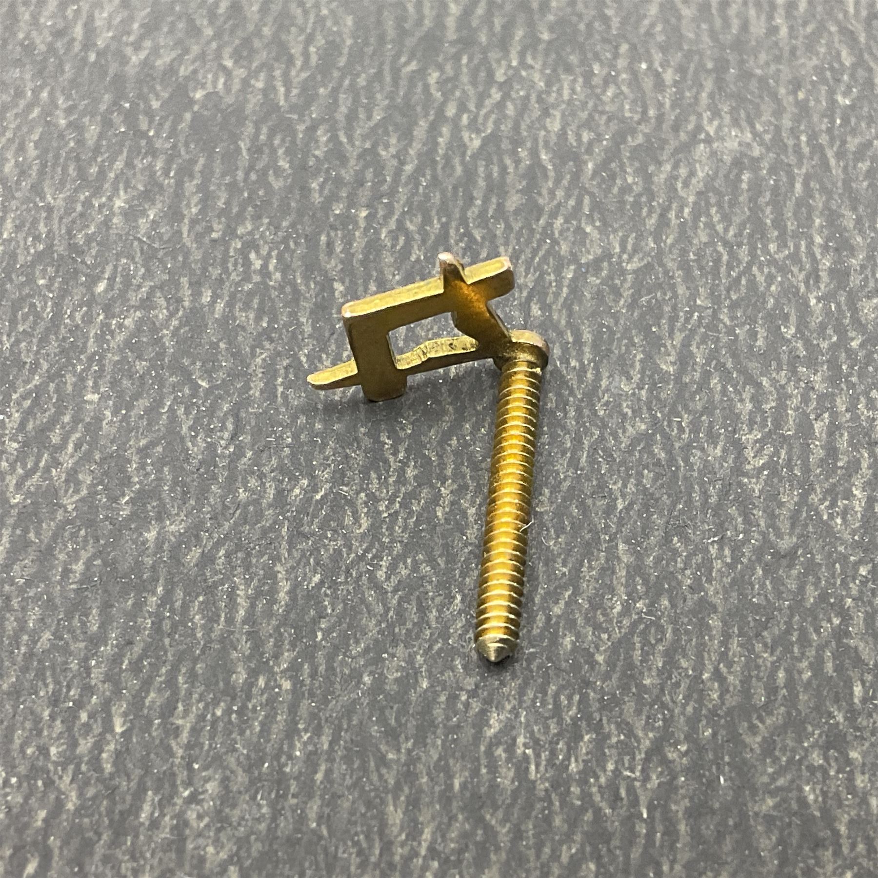 9ct gold Masonic Past Masters jewel, presented to 'W Bro Keith Leonard Hoggard by the bretheren of the Lodge St Andrew as a mark of esteem for valuable services rendered as worshipful master 1989-1990', hallmarked, together with a 9ct gold Masonic stick pin and stud