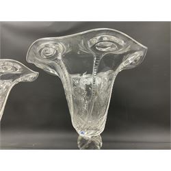 Pair of Art Nouveau clear glass vases in the manner of Stuart & Sons, of bell form with fluted rim, with relief and cut floral decoration, upon twisted stem and circular foot, H17cm
