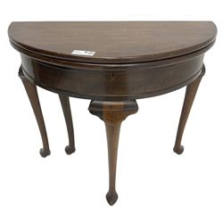 19th century walnut demi-lune side table, hinged two leaf top revealing storage well and flat surface, single gate-leg action base, on cabriole supports with pointed feet