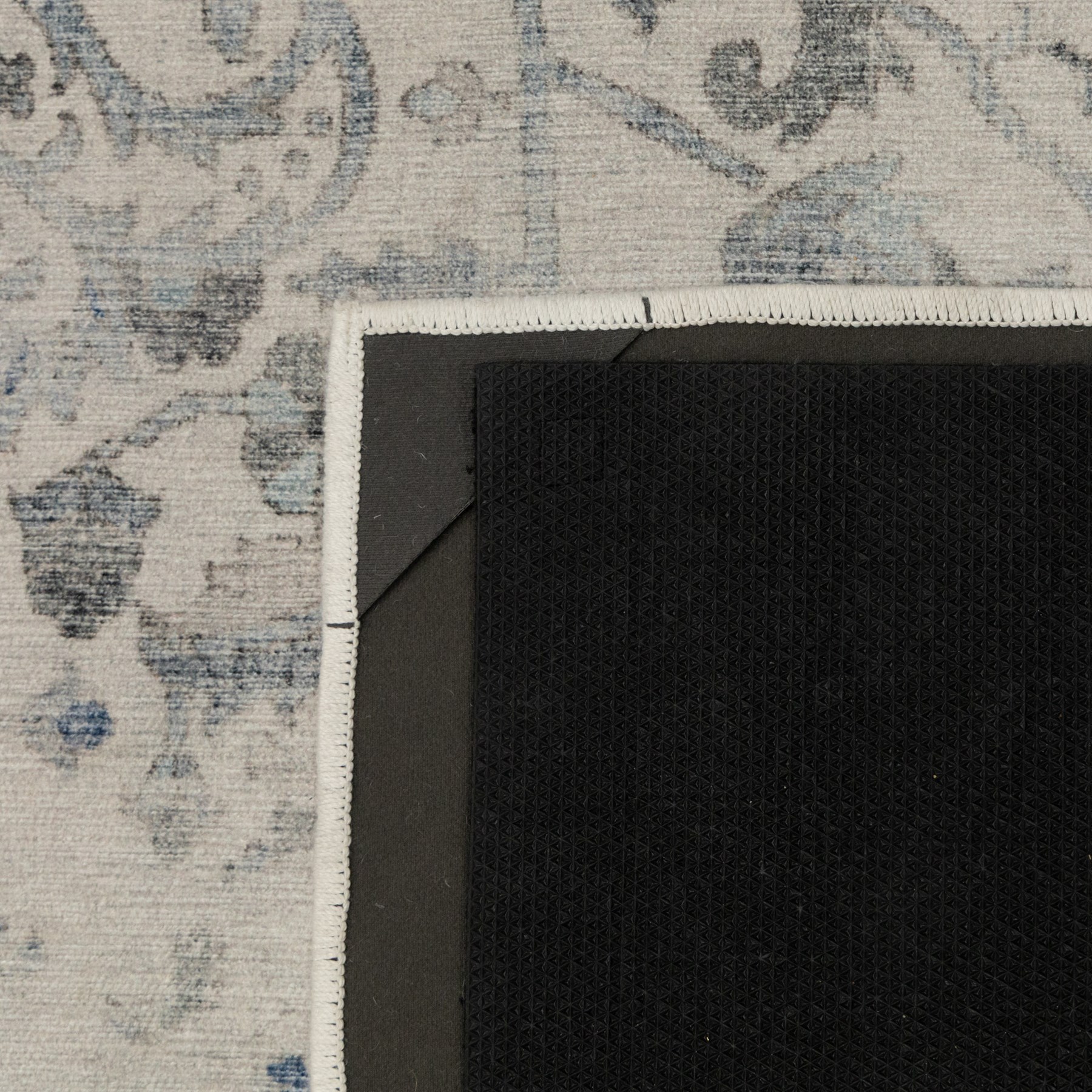 Ruggable - ‘Sarrah’ blue quartz flatwoven washable rug, ivory ground with blue and grey floral medallion, scrolling foliage and patterned borders, with a distressed effect finish, two-piece construction comprising a removable cover and separate pad, with a water-resistant and stain-resistant polyester barrier
