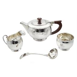 Three piece tea set by Charles S Green & Co Ltd, Birmingham 1972 and a silver suace ladle, Fiddle pattern by Deakin & Francis Ltd, Birmingham 1973, approx 27.4oz