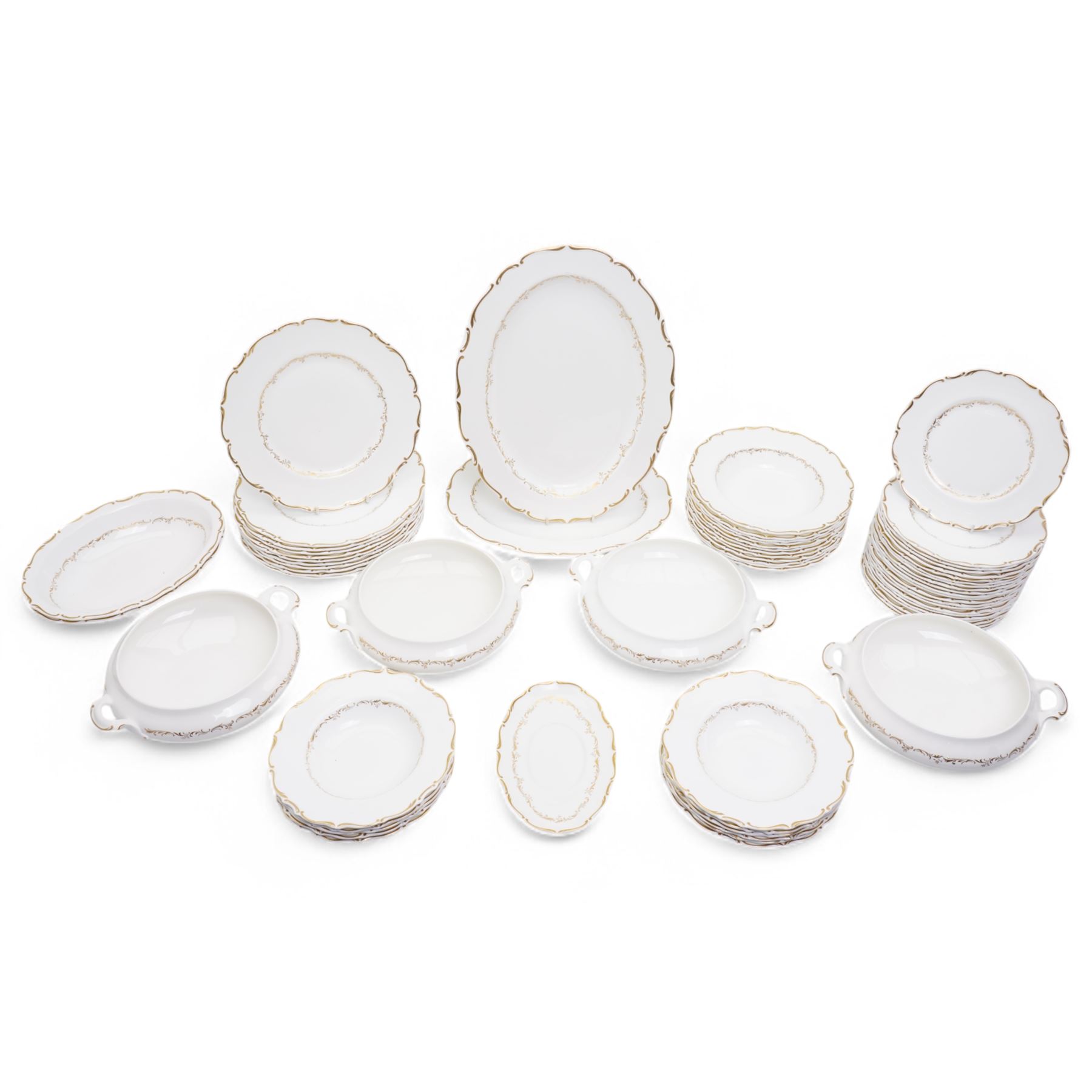 Royal Doulton dinner service in the 'Richelieu' pattern, comprising eleven dinner plates, twenty one dessert plates, twelve soup bowls, eleven dessert bowls, four vegetable dishes, oval serving dishes and graduating meat plates 