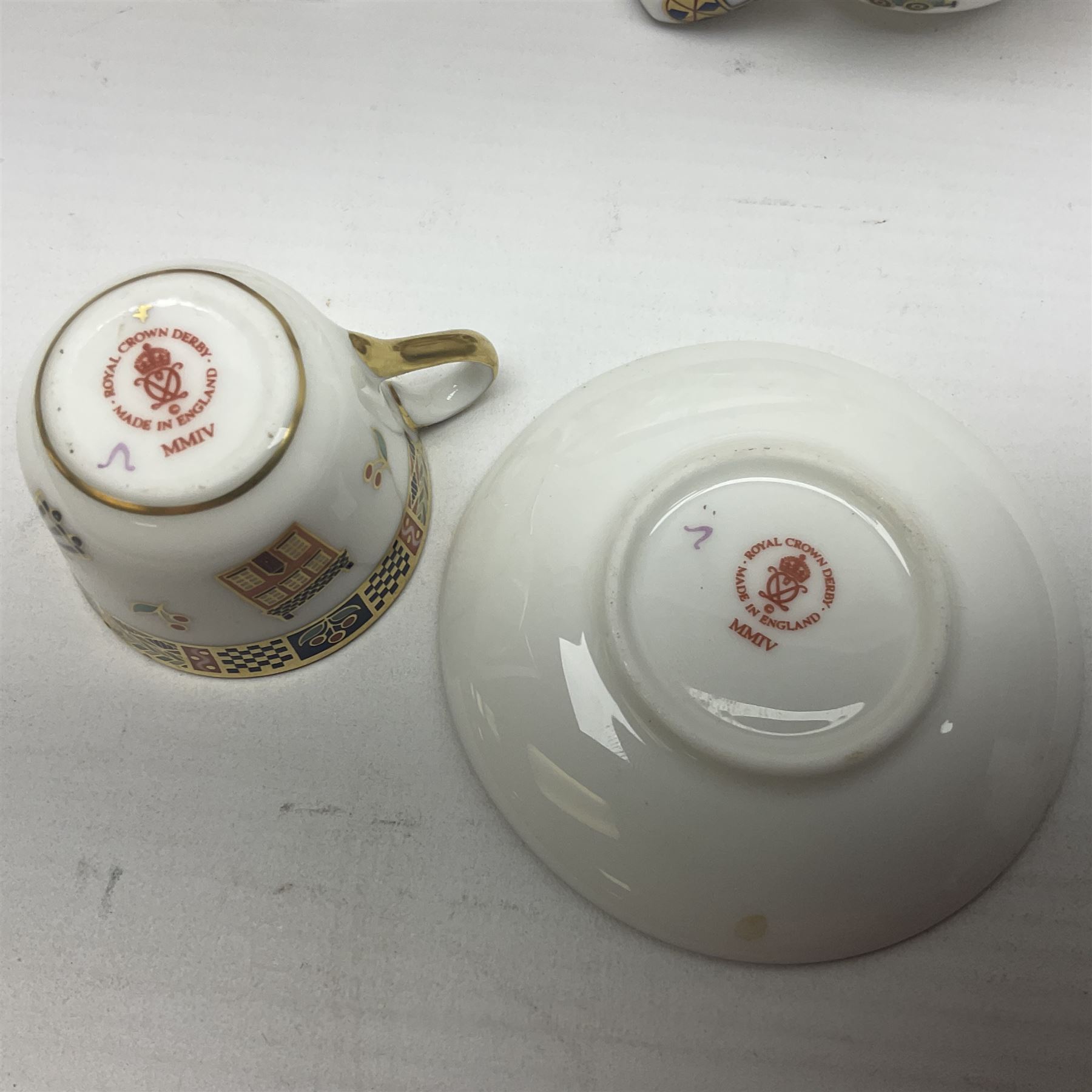 Royal Crown Derby Treasures of Childhood cabaret set, comprising tray, milk jug, sucrier, teacup and saucer, together with two Royal Crown Derby Treasures of Childhood paperweights Fleur and Ragdoll Sailor and Teddy bear paperweight, all paperweights are without stoppers