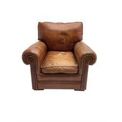 Large two seat sofa upholstered in tan 'Derwent' leather (W200cm D100cm H85cm), and matching armchair (W95cm)