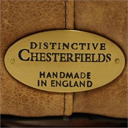 Distinctive Chesterfields - traditional shape four seater Chesterfield sofa, the rolled back and arms upholstered in deep-buttoned tan leather with matching loose seat cushions, raised on six turned supprorts