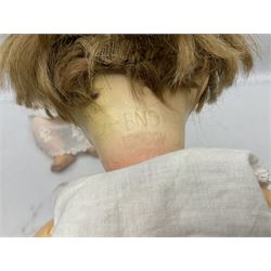 Heubach Koppelsdorf Germany bisque head doll with applied hair, sleeping eyes, open mouth with teeth and composition body with jointed limbs; marked 'Heubach Koppelsdorf 342.6/0 Germany' H34cm; Armand Marseille bisque head baby doll with moulded hair, sleeping eyes, open mouth and composition body with jointed limbs; marked 'A.M. Germany 351./8.K.; and BND London all composition doll (3)