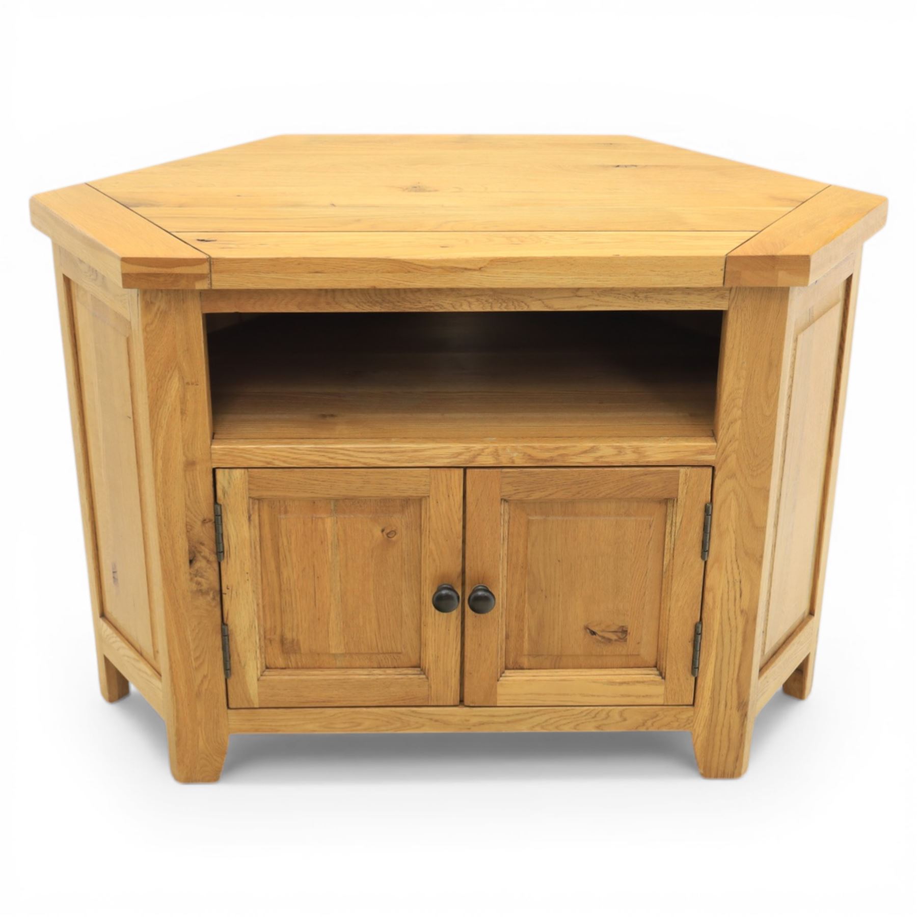 Modern light oak corner television stand, open recess above two cupboard doors with aperture to the back