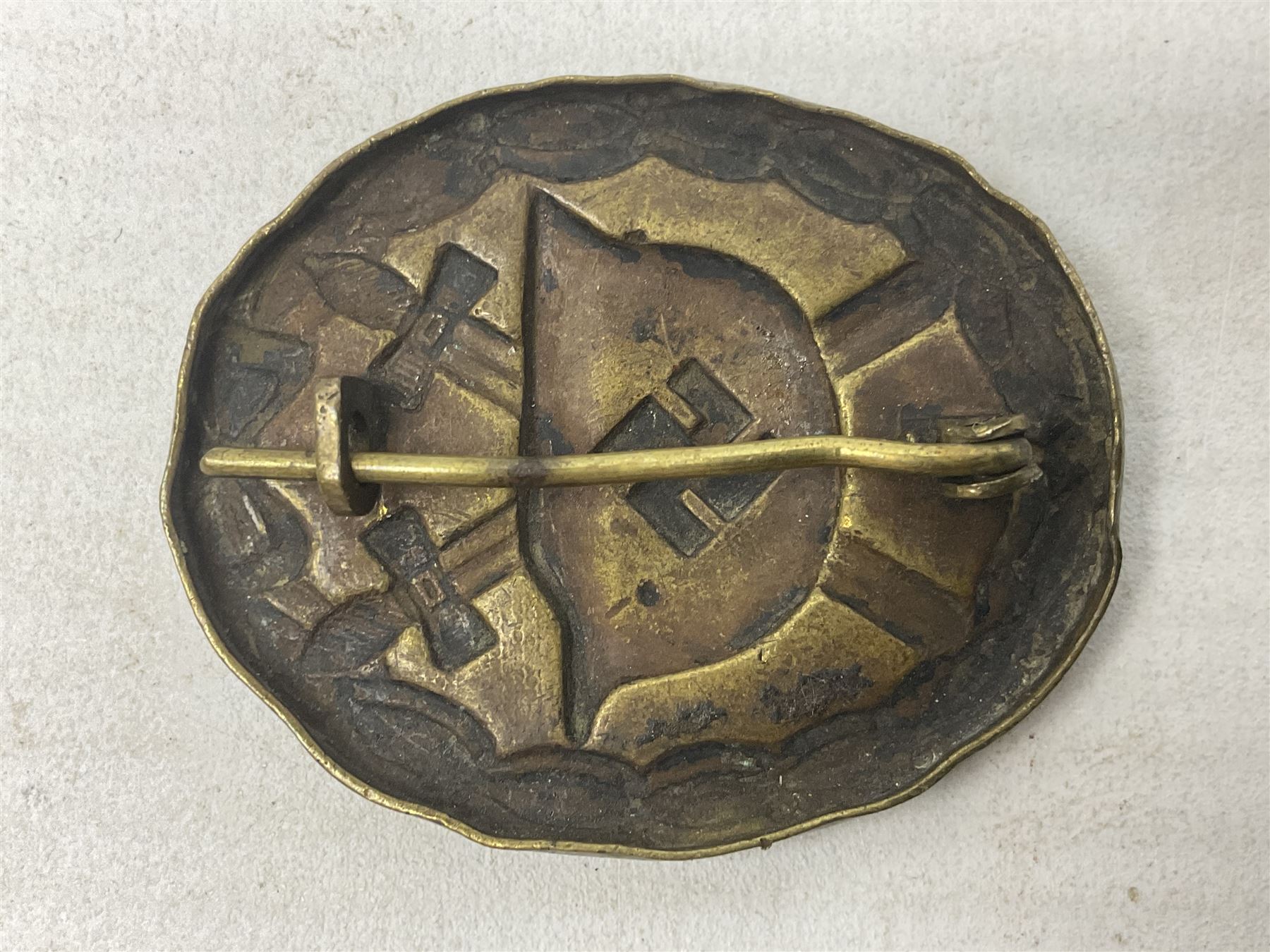 Three WW2 German badges - Close Combat Clasp; Army Flak badge; and Wound badge