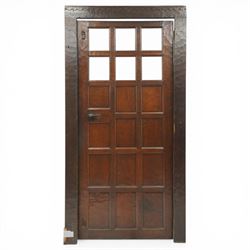 Mouseman - 1940s glazed, panelled and adzed vestibule door with castellated frame, with ca...