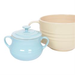 Le Creuset ceramic kitchen wares in cream and light blue, including pie dishes, baking dishes, petit casseroles etc  