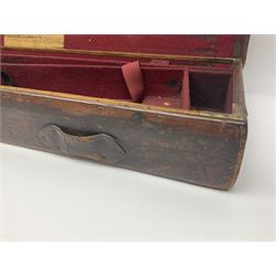 Leather shotgun case, the red baize lined interior with the trade labels of Westley Richards & Co., London, a brass plaque inscribed 'T Nevin, Mirfield, Yorkshire' to cover, with key, case to fit barrel 76cm (30 inches)  
