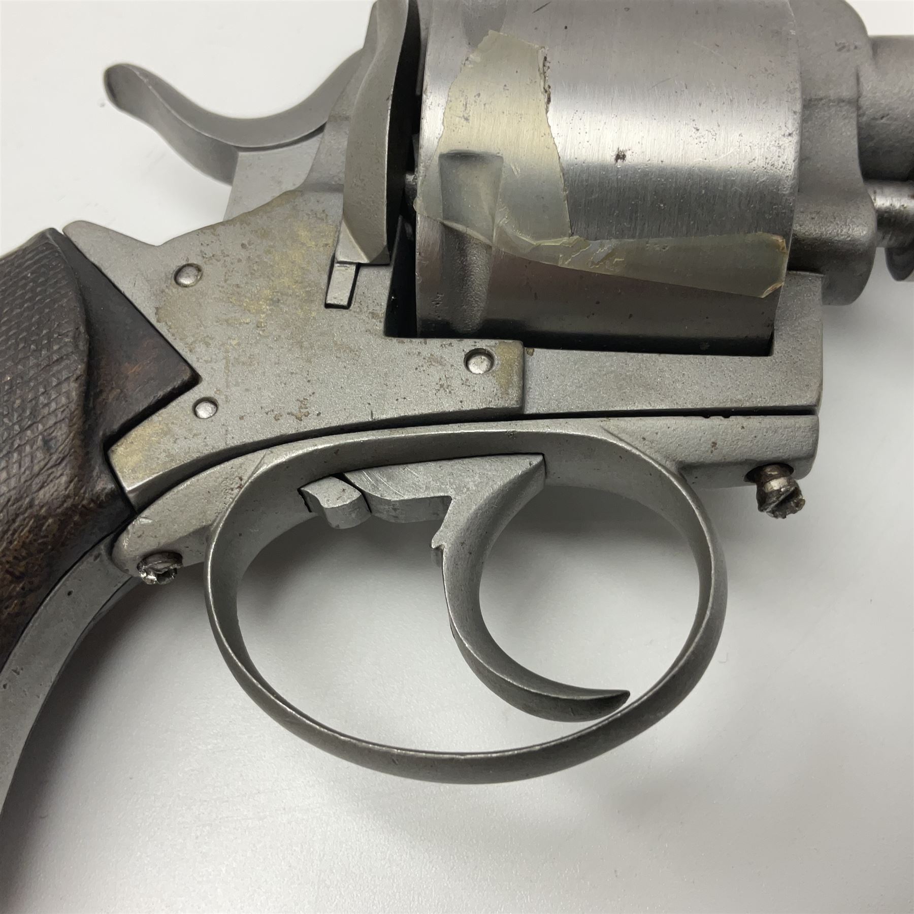 The major parts only of a British Bull-Dog .500 Boxer five-shot revolver comprising stripped down framework, cylinder, trigger with guard, functioning hammer and two-piece chequered grip; retailed by G. Goth Buenos Ayres; Belgian proof marks; L19.5cm overall; in fitted mahogany case 