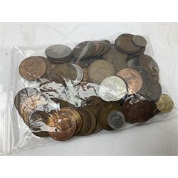 Mostly Great British coins, including commemorative crowns, pennies, two shillings and other pre-decimal coinage, old large five pence and ten pence coins, four Bank of England ten shilling notes etc