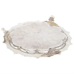 George IV silver waiter, of typical form, with shaped rim embossed with C scrolls, upon three scrolling pad feet, hallmarked William Brown London 1829, D20cm