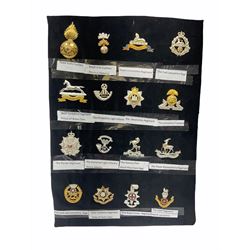 Collection of thirty-two reproduction military badges, including Royal Scots Fusiliers, Royal Lincolnshire Regiment, The Boarders Regiment etc. 